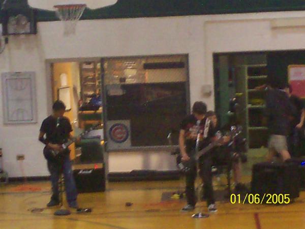 im the one in the front right. this is from when my band played at my school's v-show, june 5th, 2009. i dont look much like that anymore