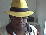 Dick Tracy-esque with yellow shades.